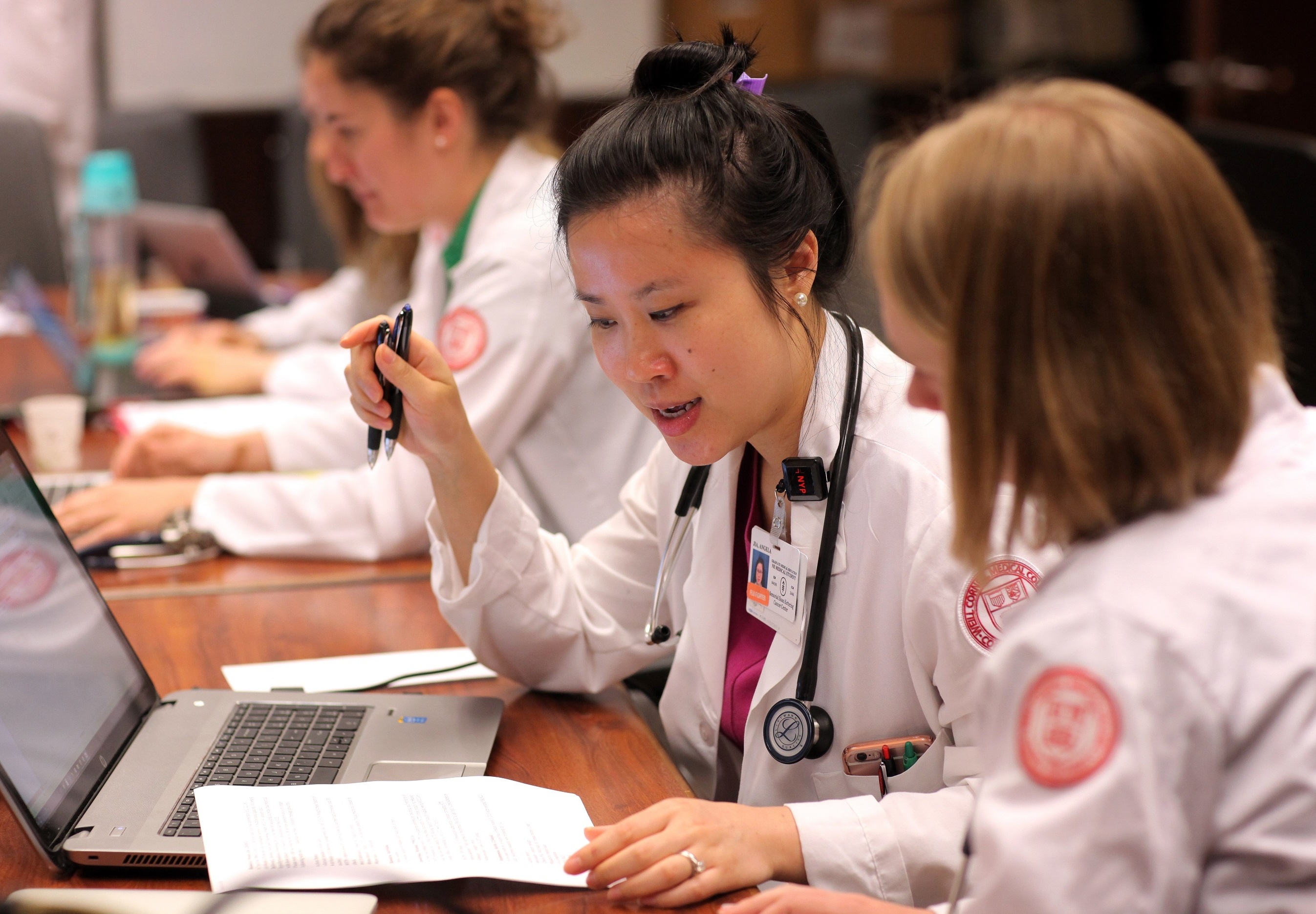 Female doctors studying. Credit: John Abbott