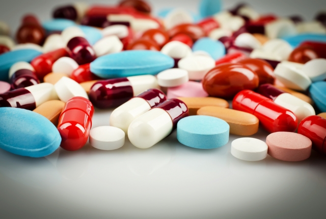 multicolored pills: capsules, tablets, softgels