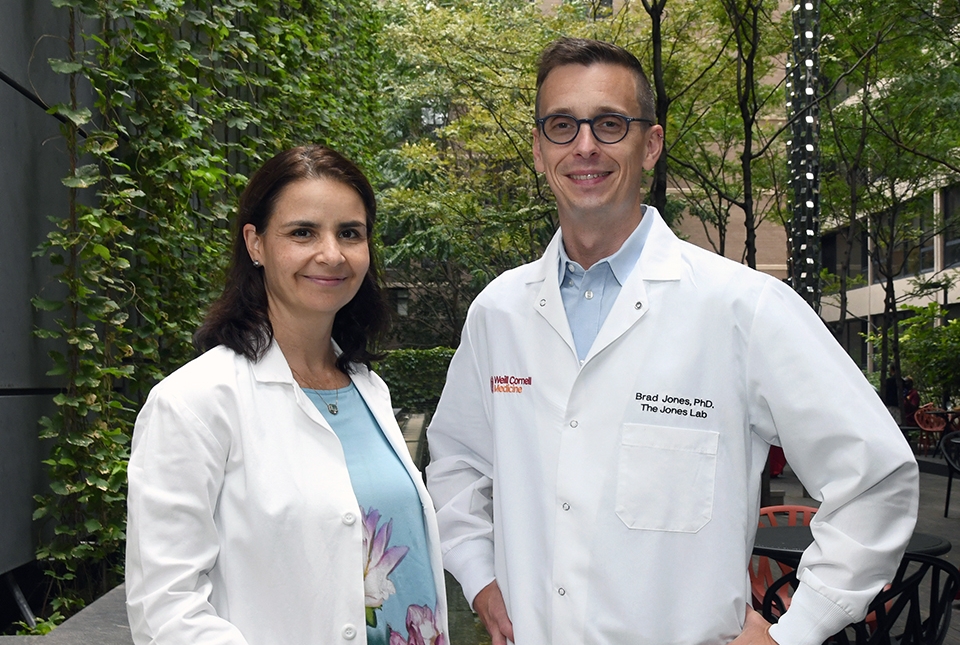 photo of a woman and man in lab coats