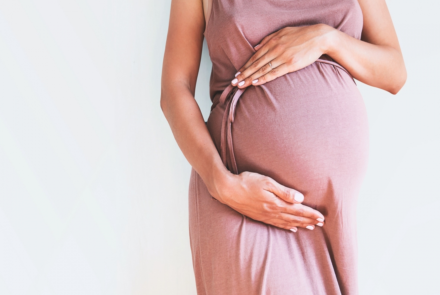 a woman holding her stomach