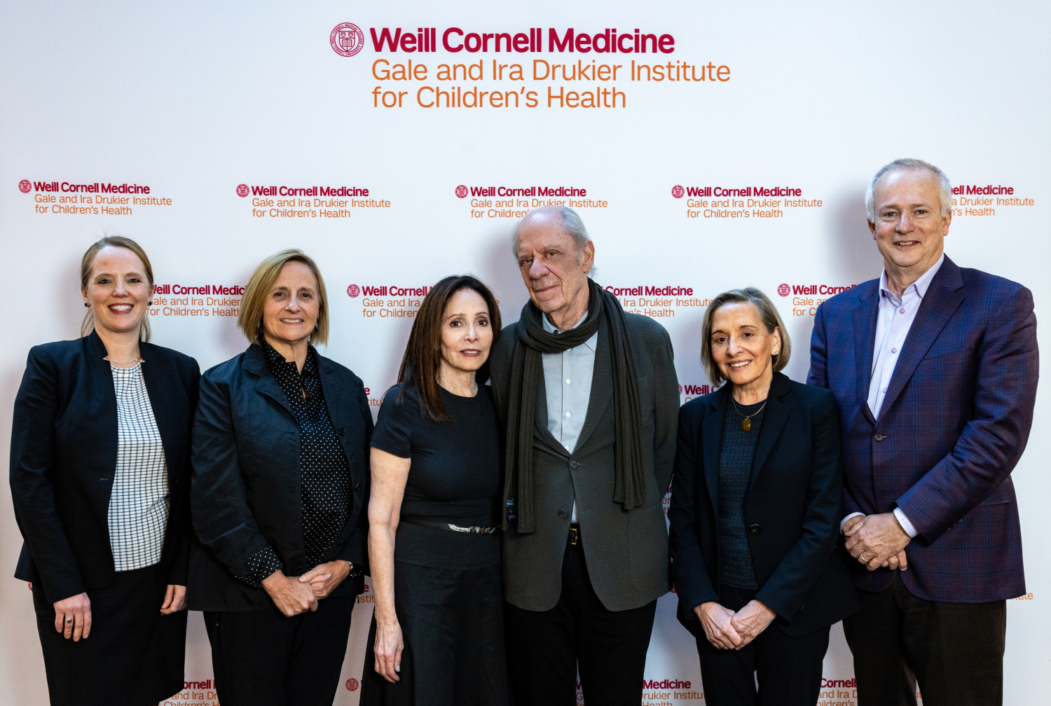 Group shot of researchers, institutional leaders and philanthropists