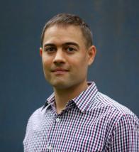 A man posing for a photo