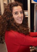 a woman smiling for a portrait