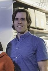 A man posing for a photo