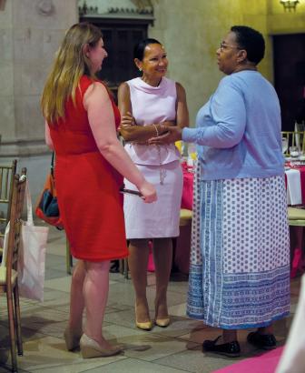  Dr. Newman talking with attendees at a June event at Riverside Church, co-hosted by Susan G Komen Greater New York City.