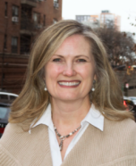 a woman smiling for a portrait