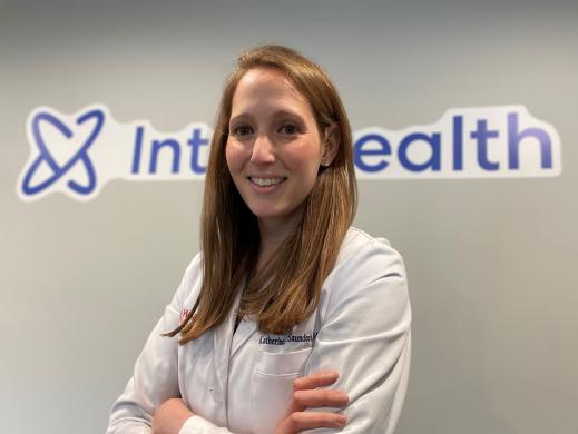 a woman smiling for a portrait
