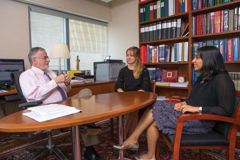 Dr. Andrew Schafer (left), with students Caitlin Gribbin ’18 (center) and Aditi Gupta ’18