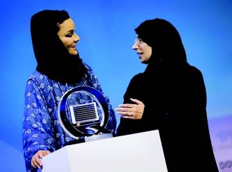 two women at a podium