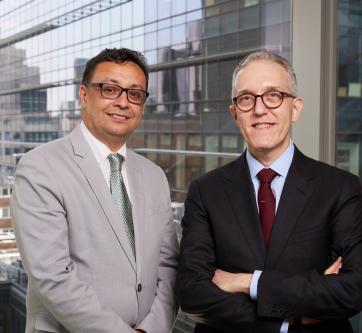 two men posing together