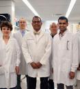 Dr. Rajiv Ratan, center, and his research team at the Burke Neurological Institute
