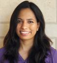 Headshot of a medical student wearing a purple shirt